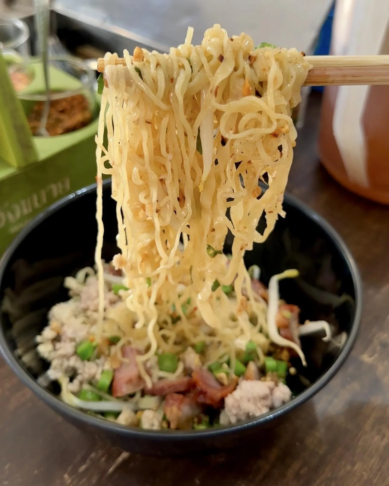 Tom yum egg noodles at Ta Chai Sukhothai Noodles in Bangkok