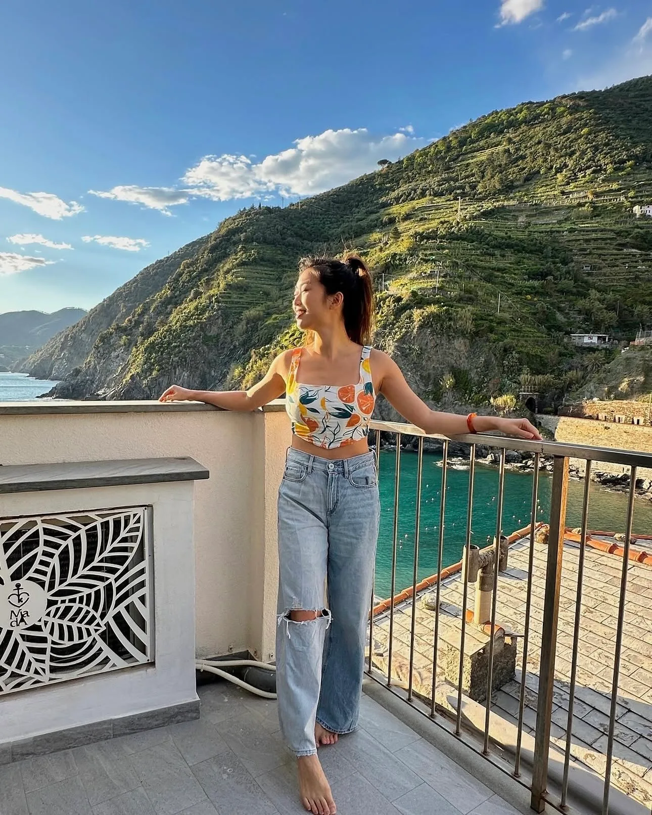 Train arriving at a Cinque Terre village station