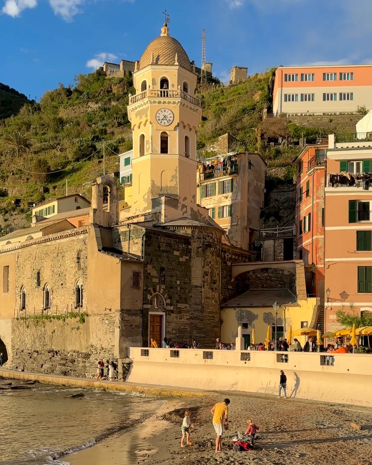 Vernazza harbor with fishing boats and colorful buildings