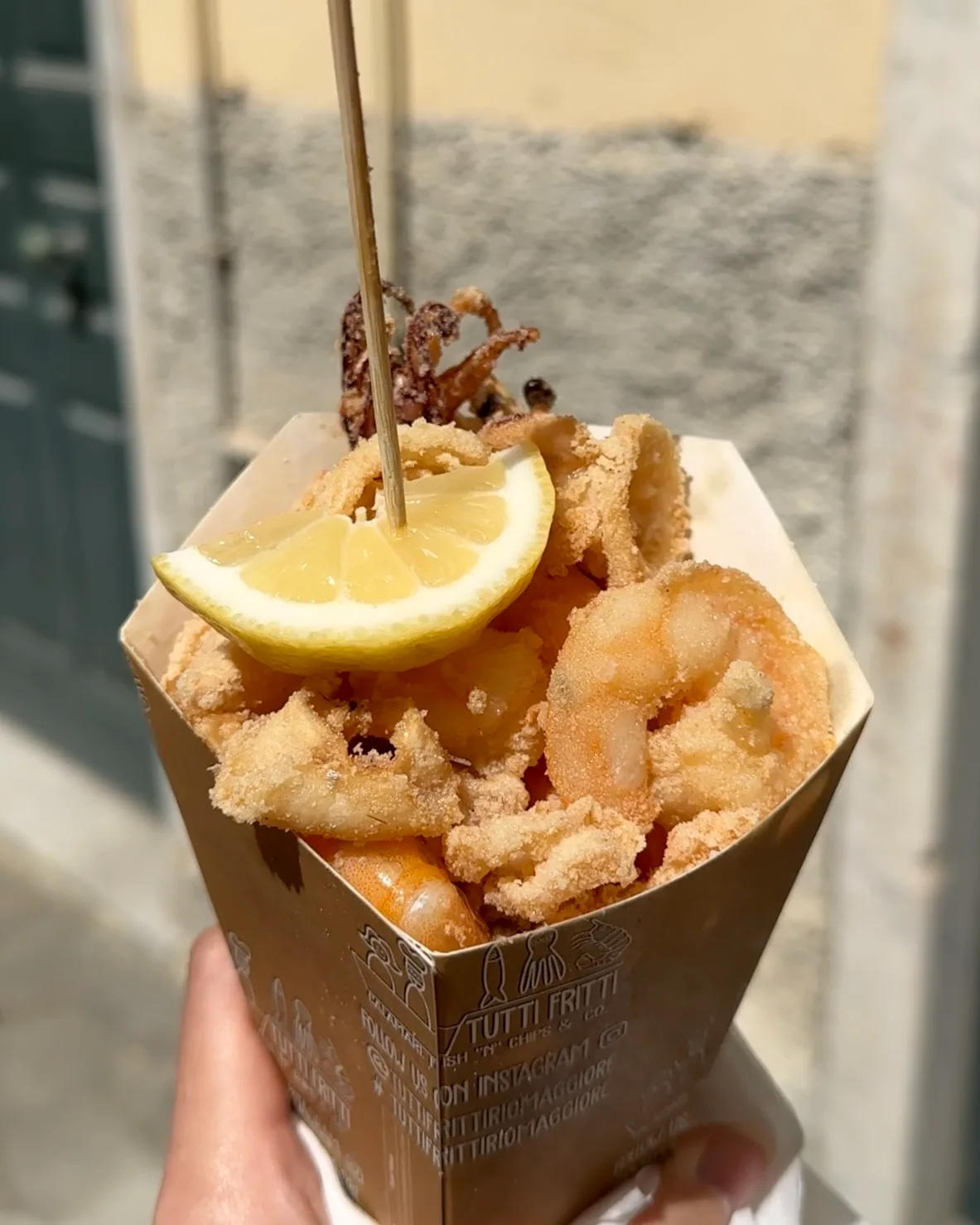 Riomaggiore village with pastel houses glowing at sunset